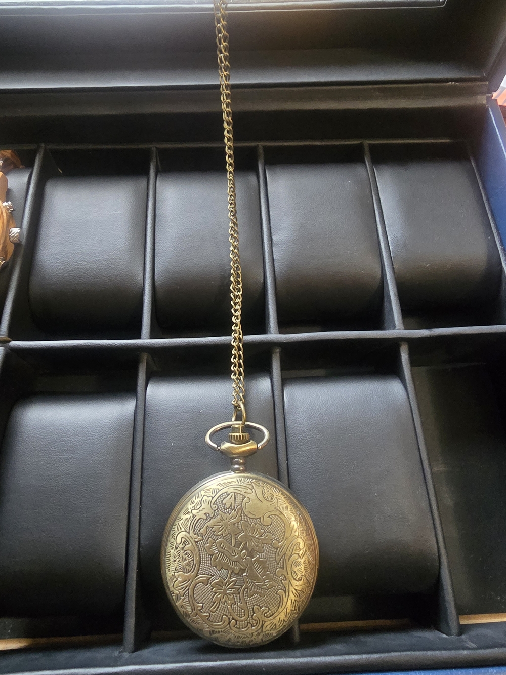 Vintage-Style Gold Pocket Watch with Ornate Engraving